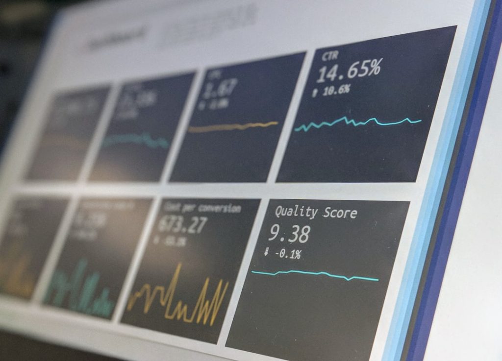 Data reporting dashboard on a laptop screen, representing AI search analytics tools for marketing teams