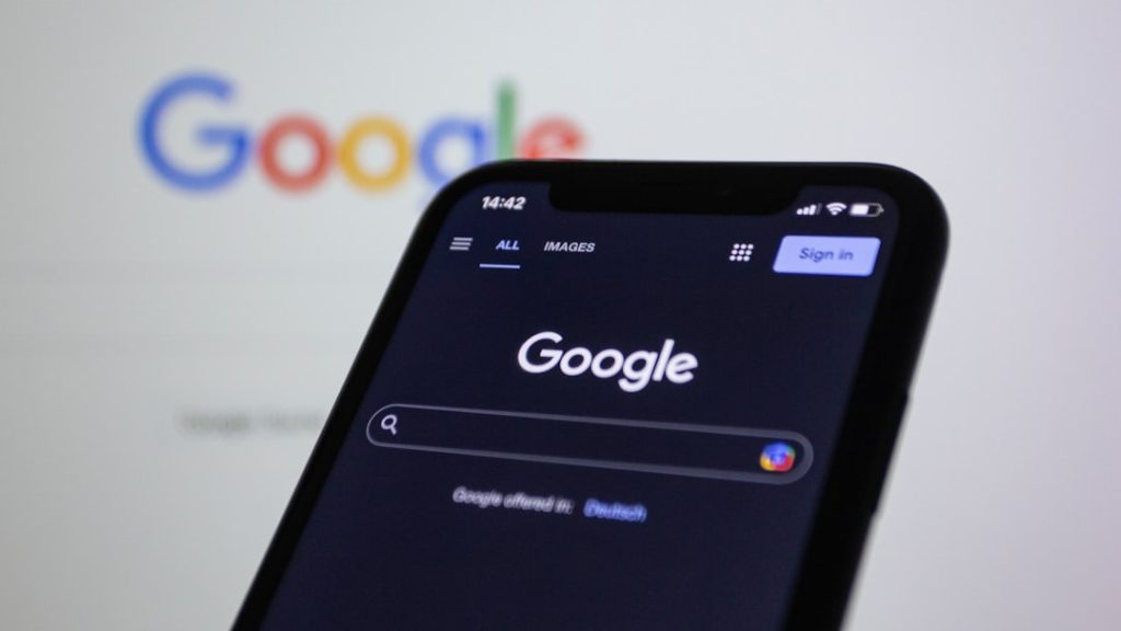 Google logo on a mobile phone screen, representing how to rank number one on Google in 2026